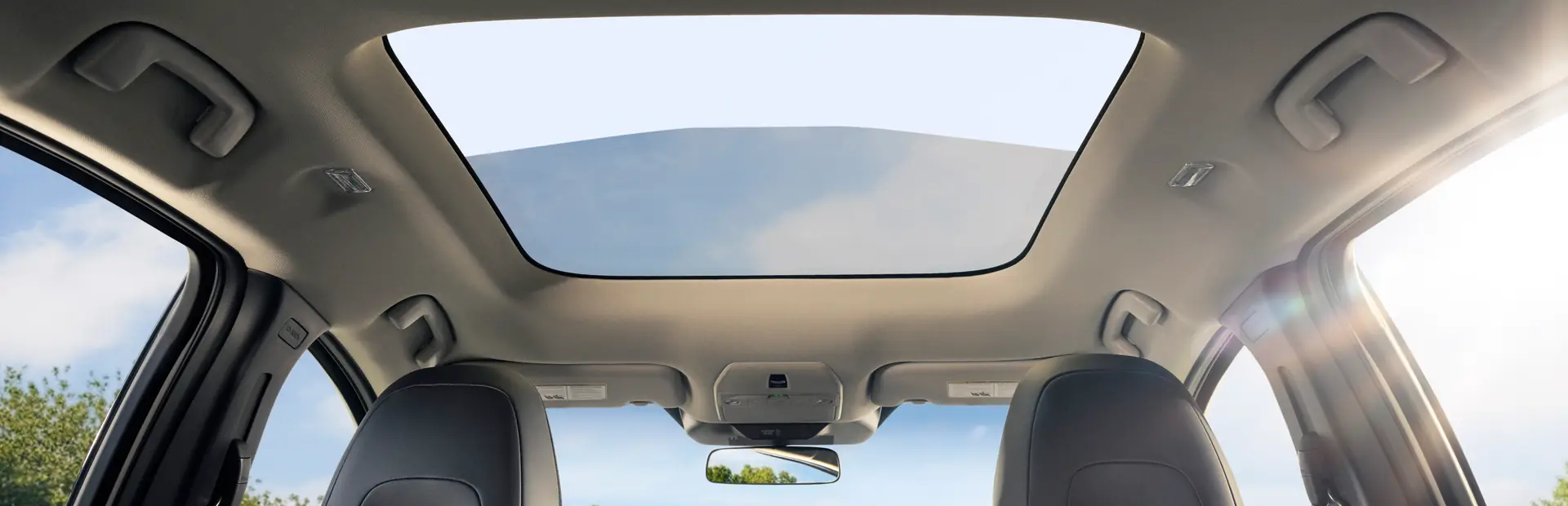 Interior image of the sunroof from the back seat of the 2027 Eclipse Sportback EV